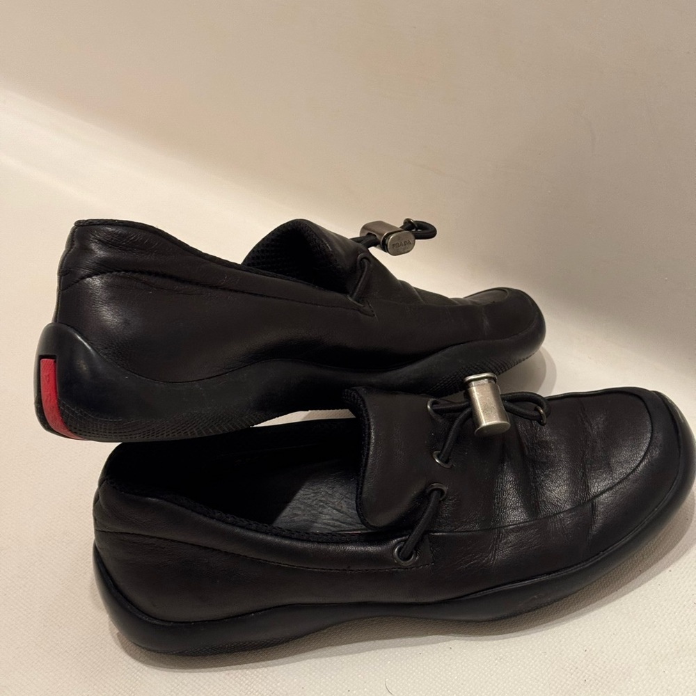 Prada Black Leather Slip-On Loafers with Silver Hardware - Picture 7 of 7